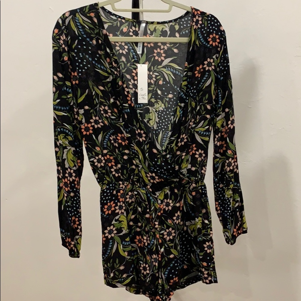 women’s romper size small. New with tags.